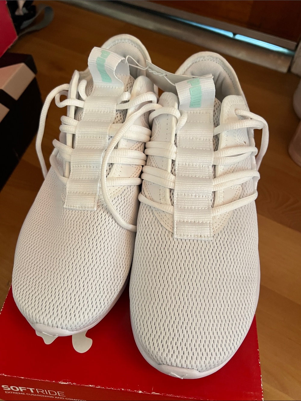 Puma women’s White Mesh Sneakers